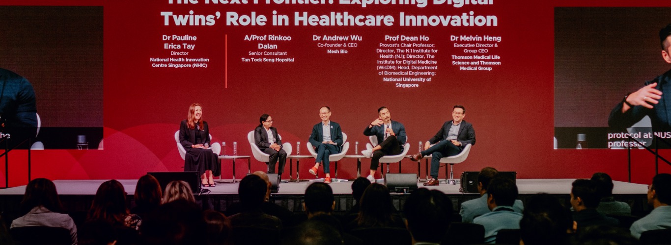 A photo of speakers onstage at SWITCH.