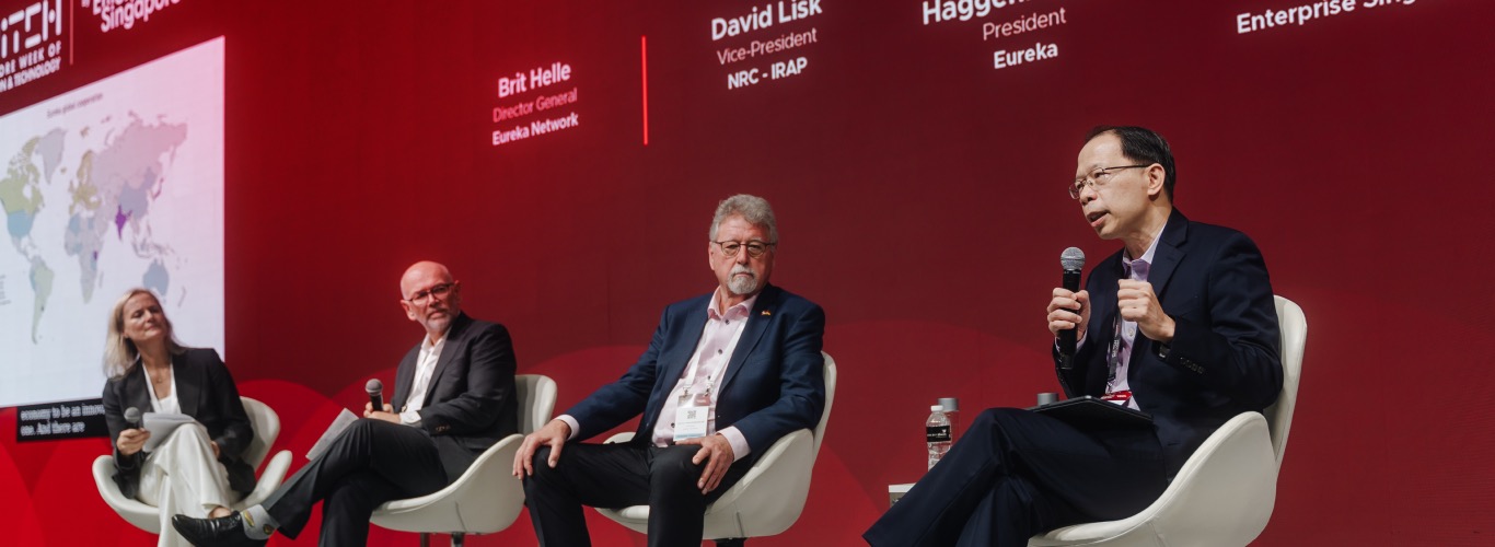 A photo of panelists onstage at SWITCH.