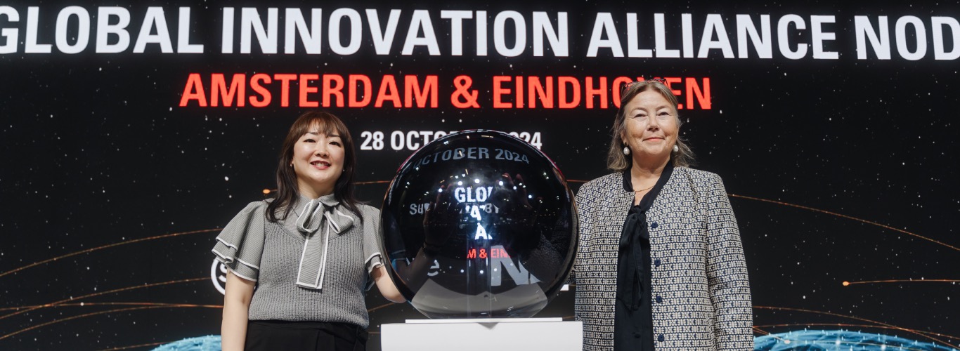 A photo of speakers onstage at SWITCH.